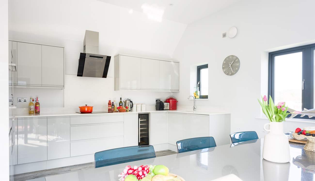 The kitchen is fully equipped with that all-important wine fridge! 