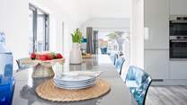 Enjoy family dinners around the large dining-table.