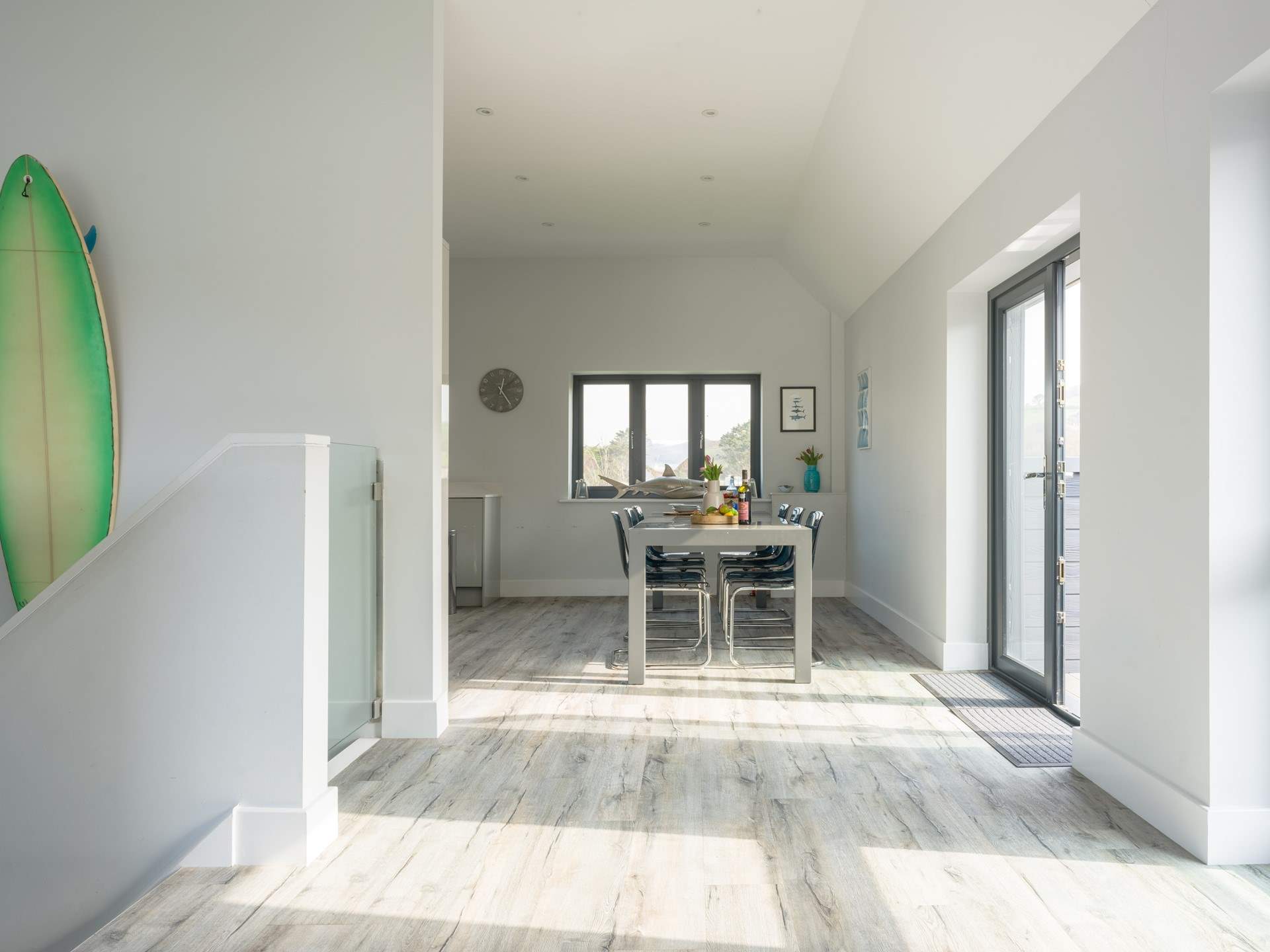 Head upstairs to the open plan living area and out on to the terrace.