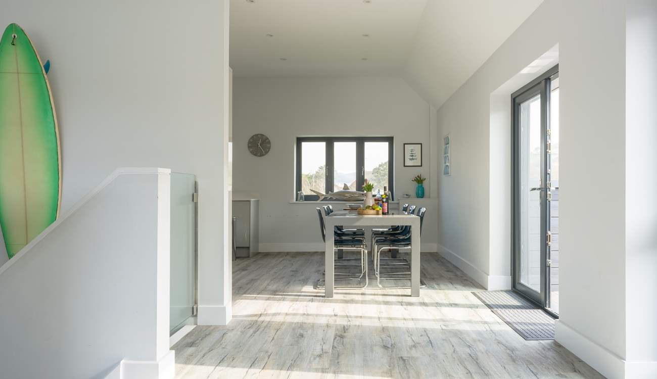 Head upstairs to the open plan living area and out on to the terrace.