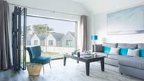 The sitting-area offers the perfect spot for the family to gather after a beach day.