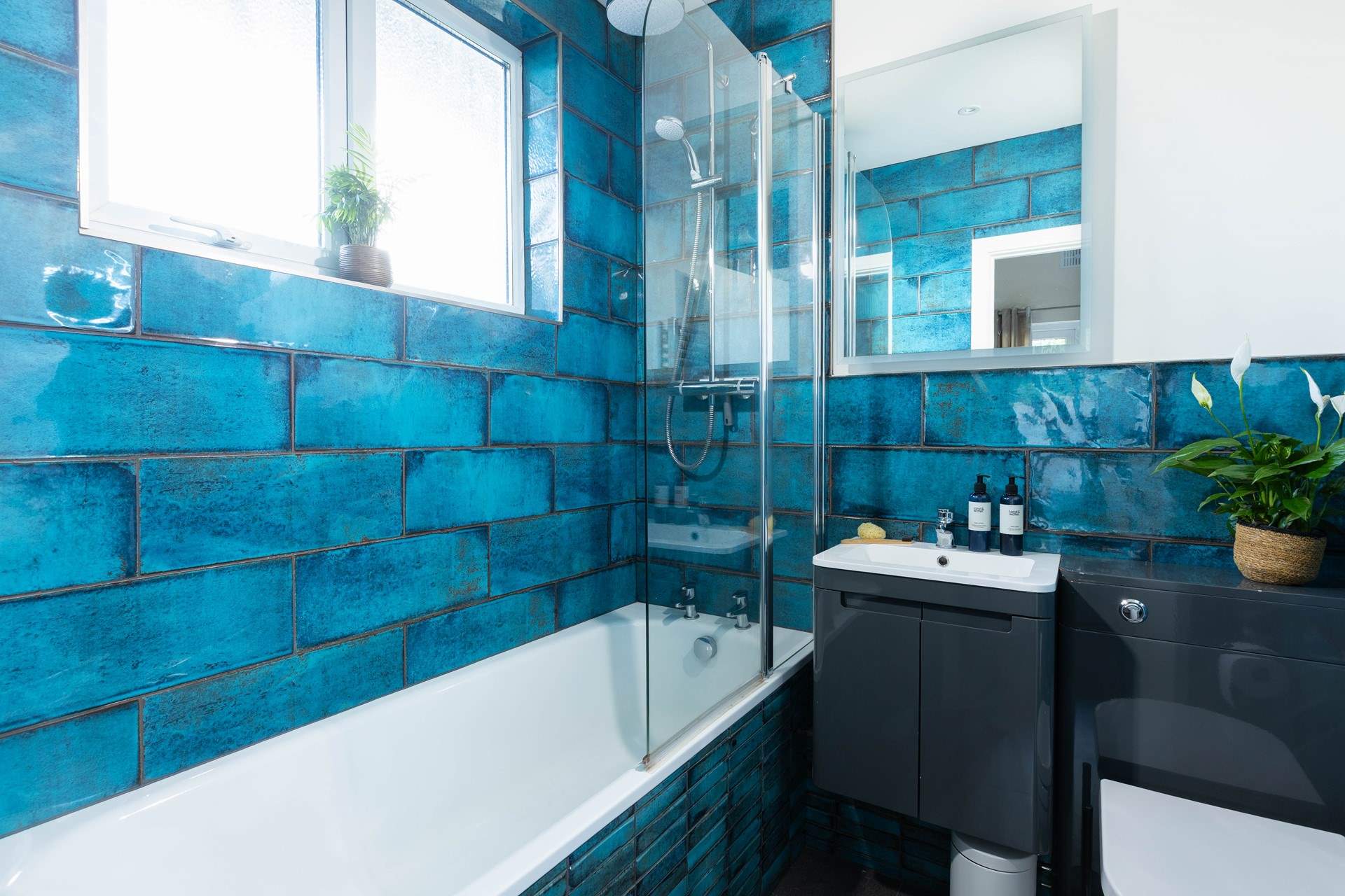 Enjoy a long soak or an invigorating shower in the en suite.