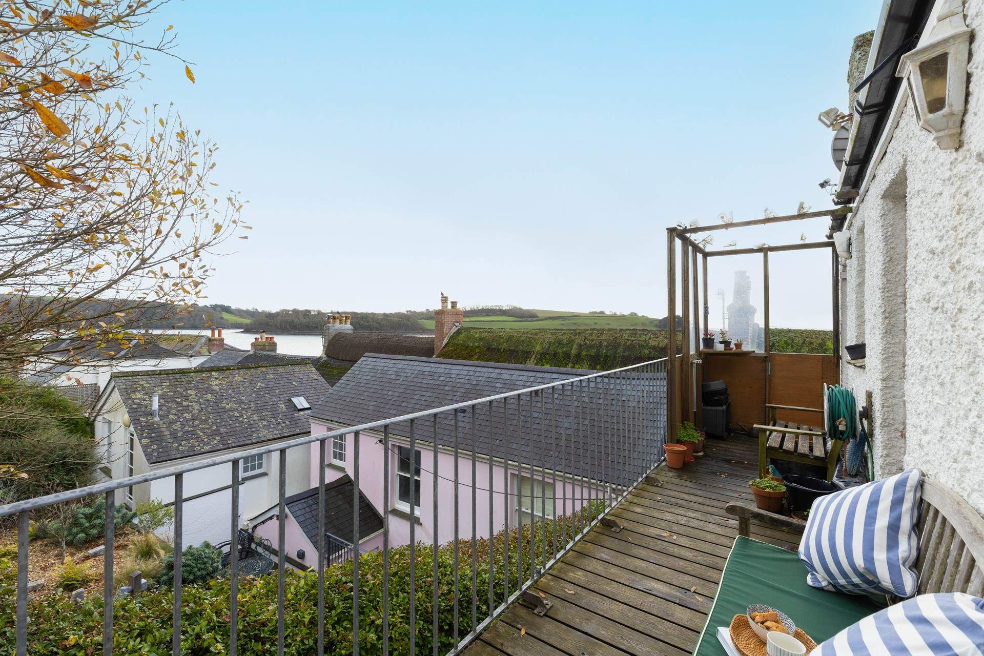 Take in the sea view over the rooftops from your prime position. 