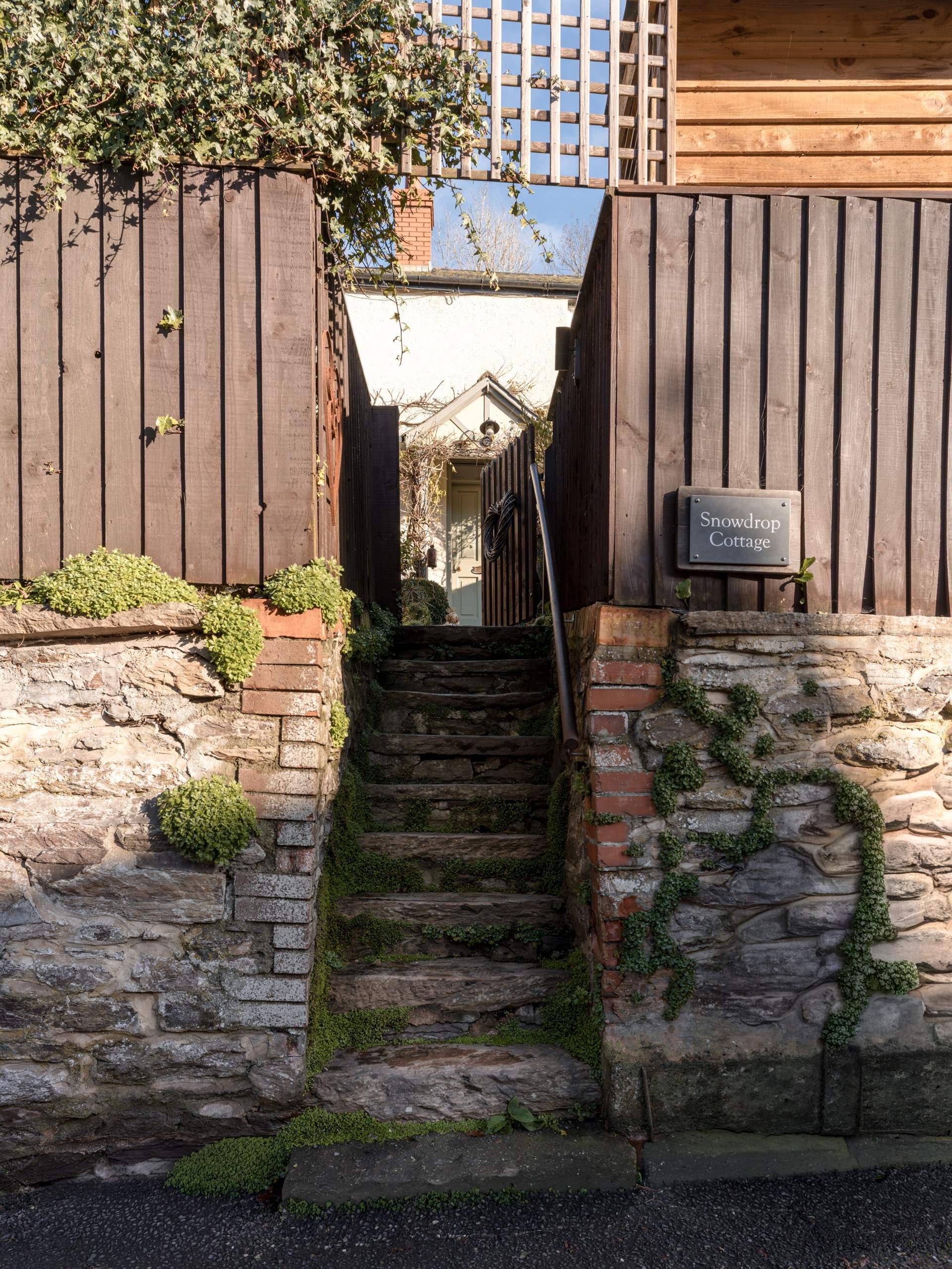 Note that there are a few steps up to the cottage from the road.