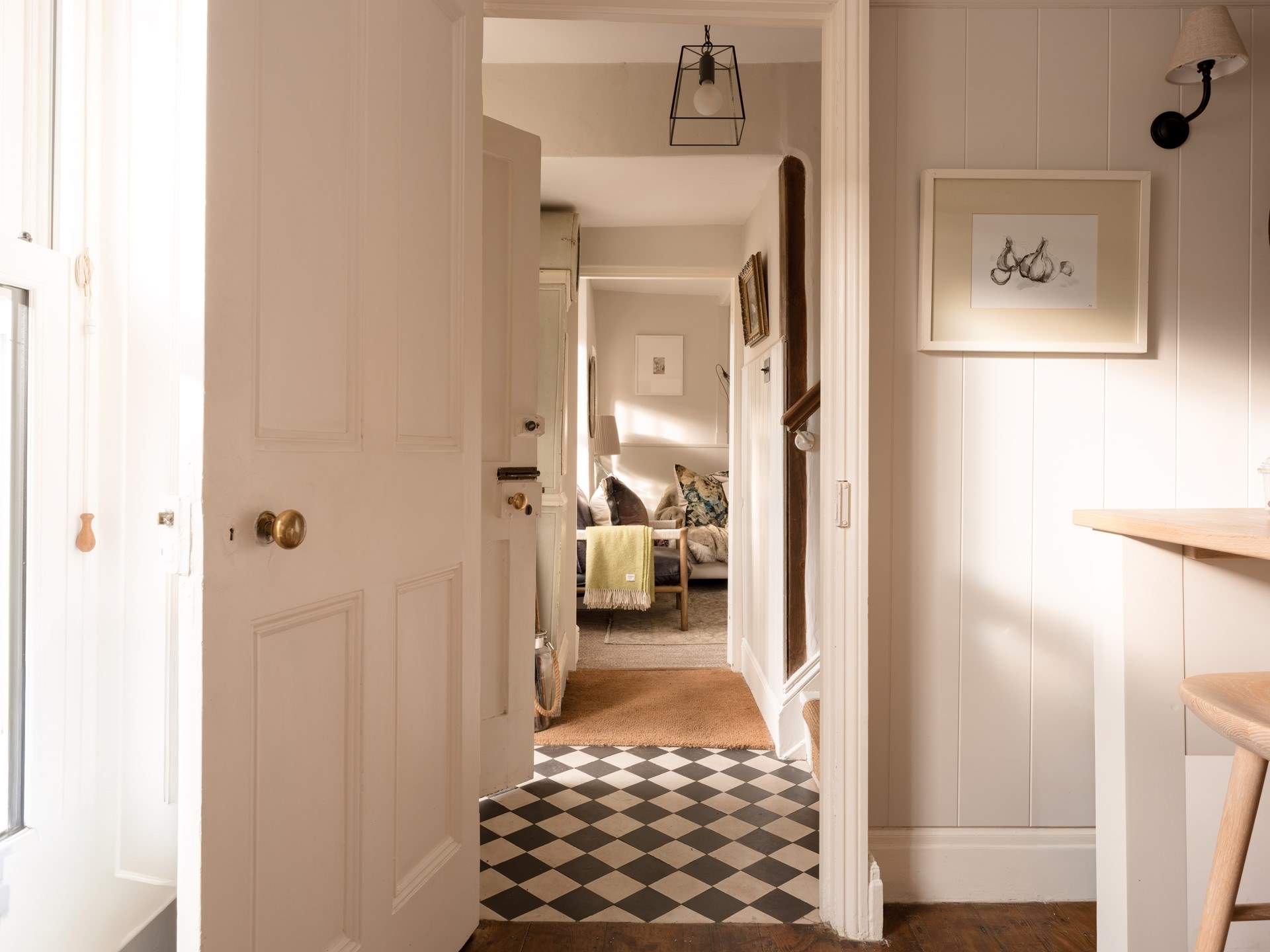 The kitchen and sitting-room are both accessed directly from the stunning lobby.