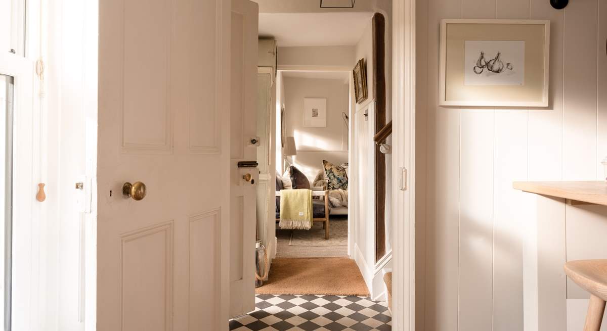 The kitchen and sitting-room are both accessed directly from the stunning lobby.