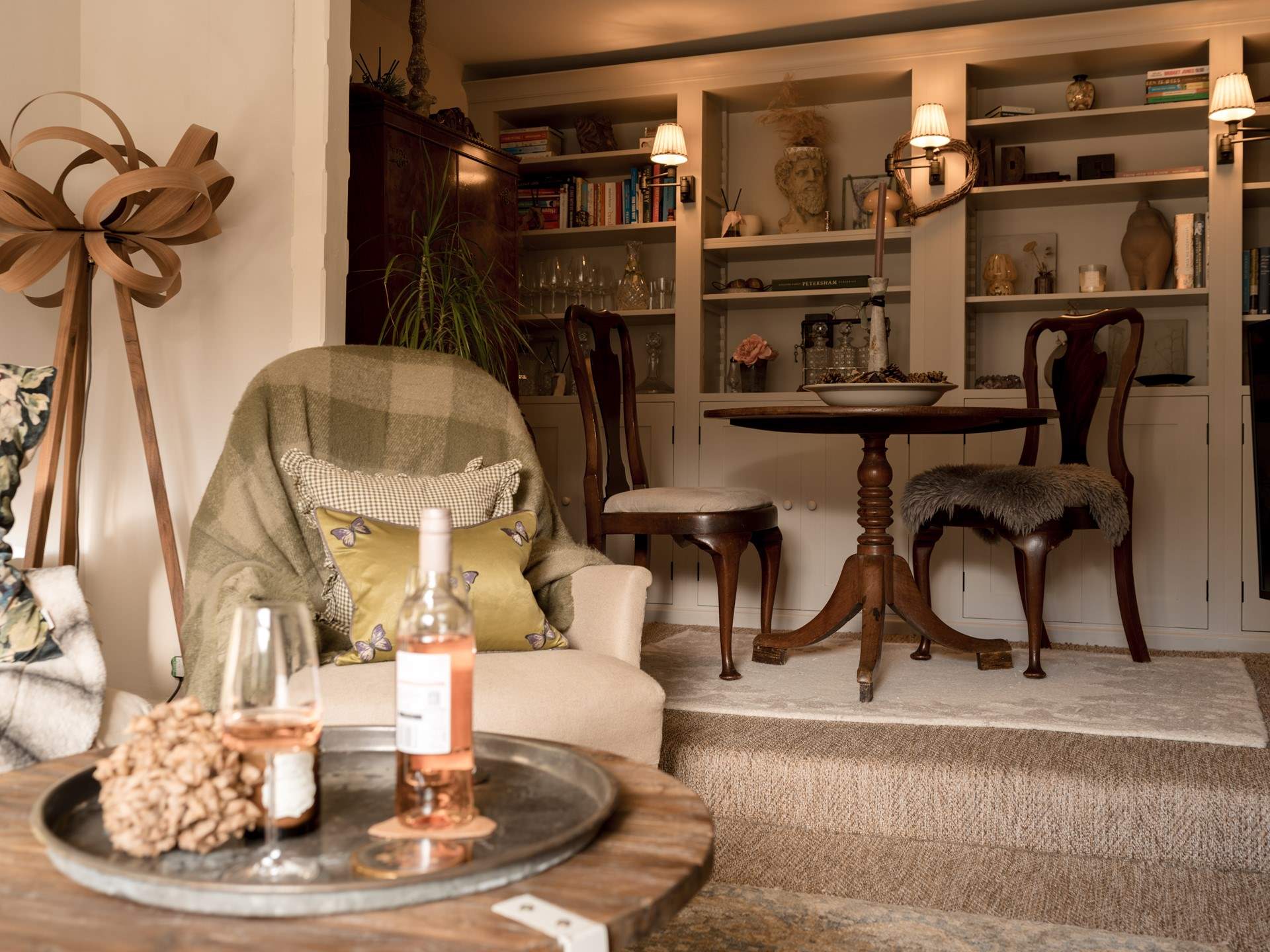 An intimate dining space is just off the sitting-room and offers comfortable seating for four (extra chairs provided).