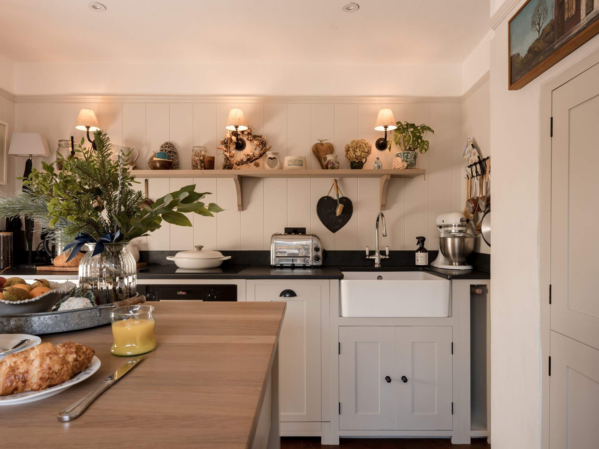 The kitchen is packed with design details, character and all the mod-cons you would expect from such a luxurious home.