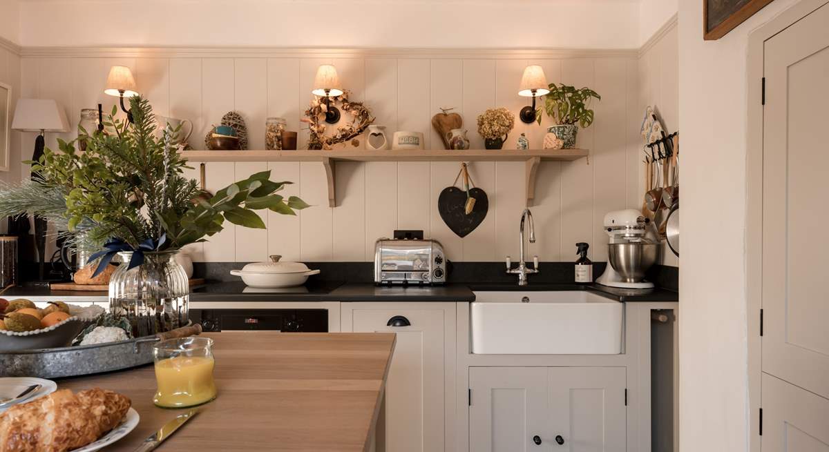 The kitchen is packed with design details, character and all the mod-cons you would expect from such a luxurious home.