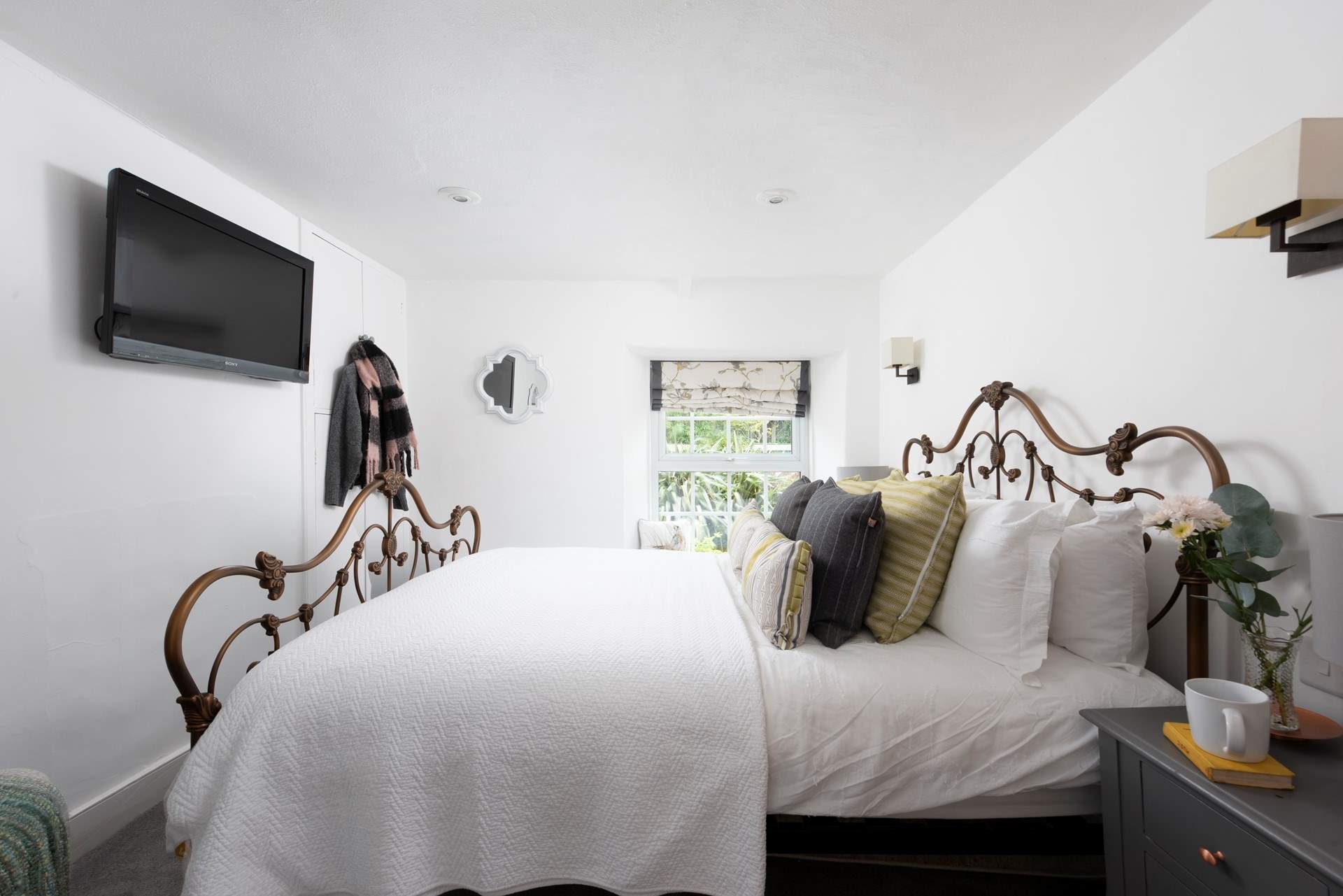 The stunning bedstead takes centre stage.