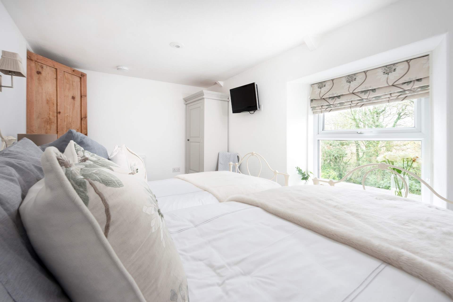 Snuggle under the covers and catch up on some TV.