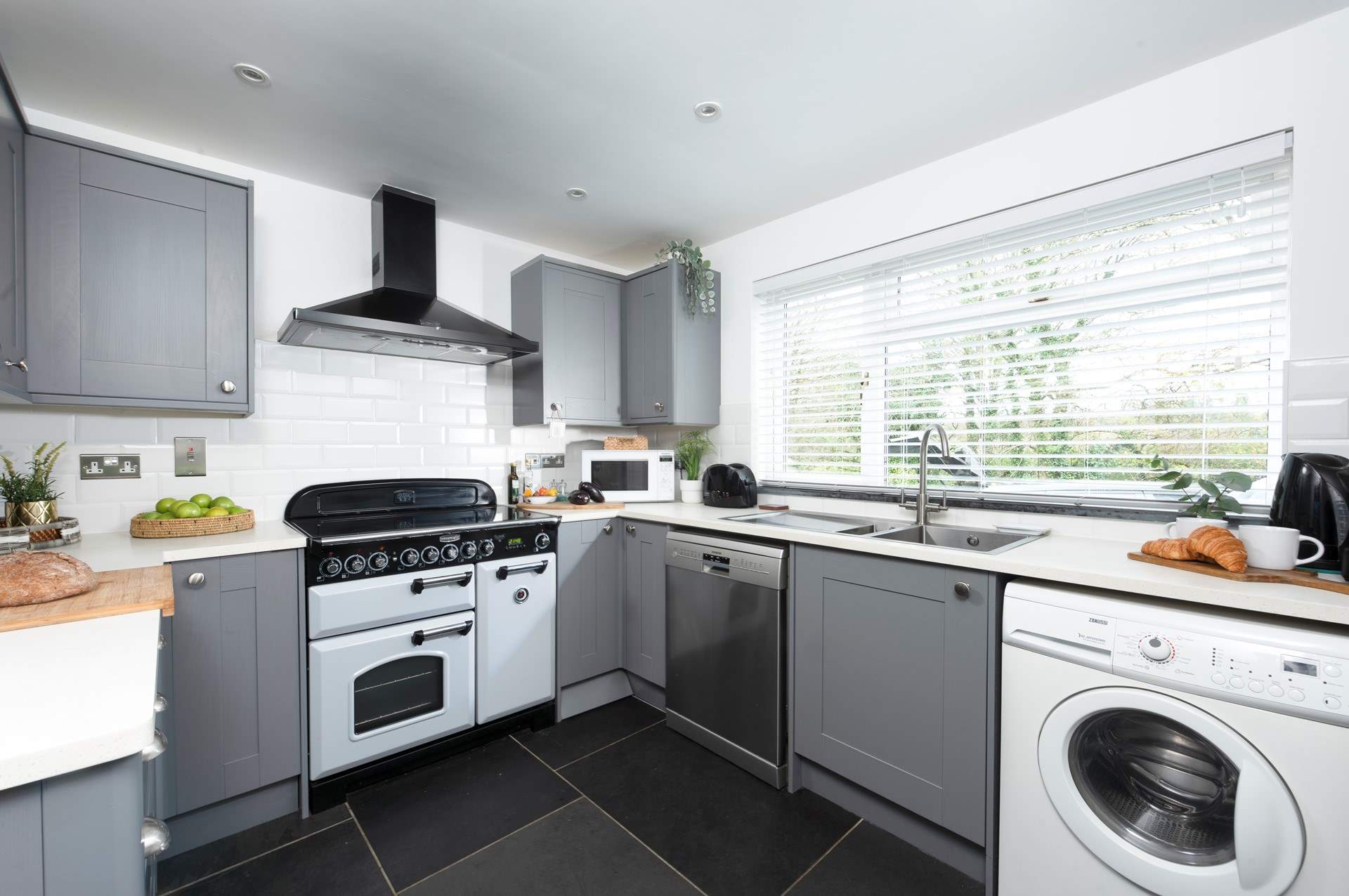 The cottage kitchen, complete with a range style cooker.