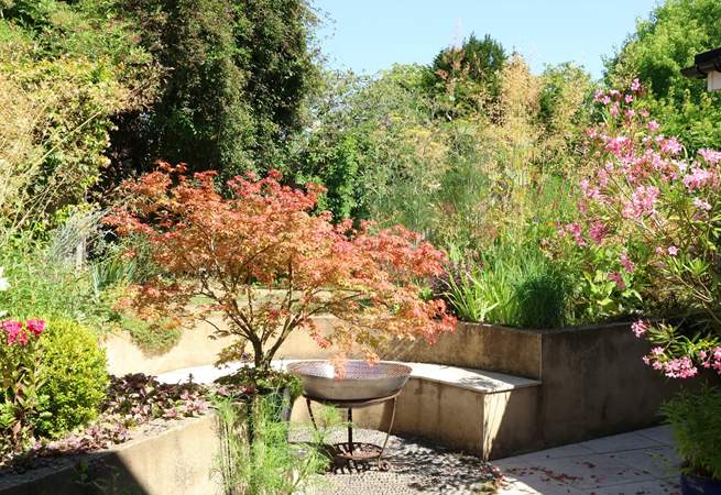 Enjoy this beautiful garden with areas the whole family can enjoy.