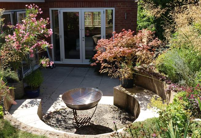 Take evening drinks around the fire-pit, the perfect place to admire the dark twinkling skies.