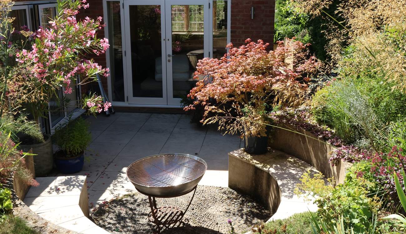 Take evening drinks around the fire-pit, the perfect place to admire the dark twinkling skies.