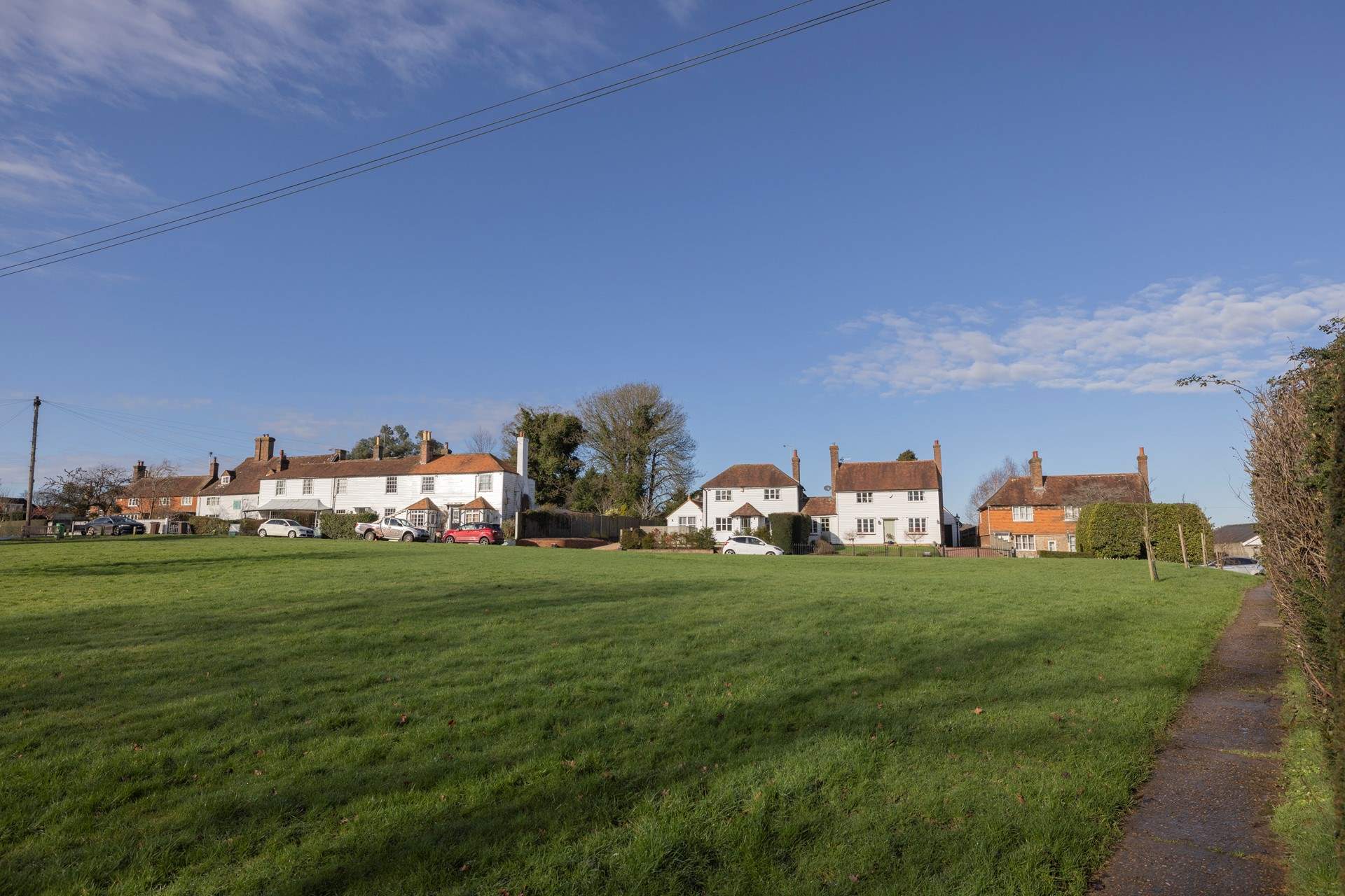 The village of Sandhurst sits in the High Weald National Landscape (formerly an Area of Outstanding Natural Beauty) between Rye and Royal Tunbridge Wells. 