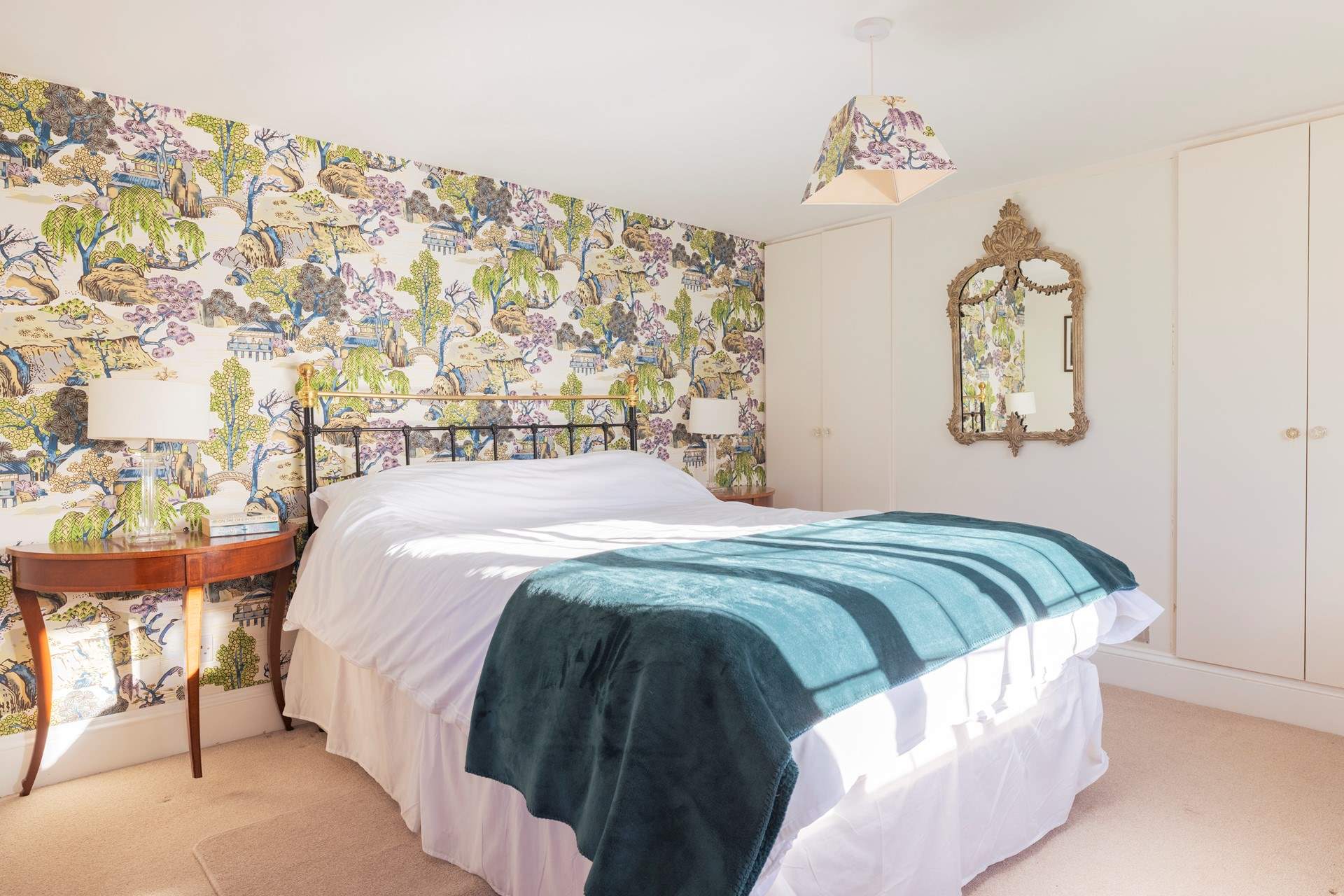 The main bedroom is so spacious and inviting.