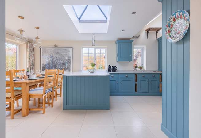 Cook away whilst enjoying the social aspect of this beautiful kitchen.
