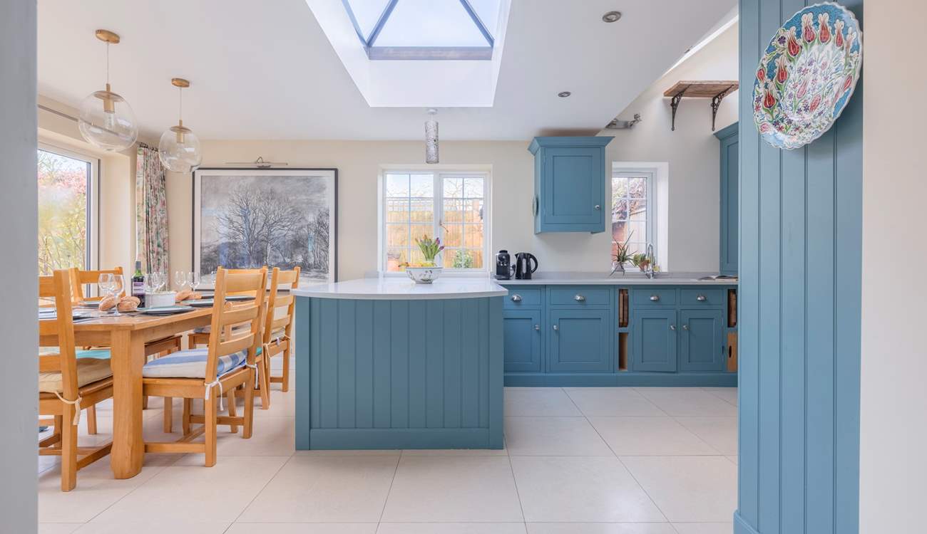 Cook away whilst enjoying the social aspect of this beautiful kitchen.