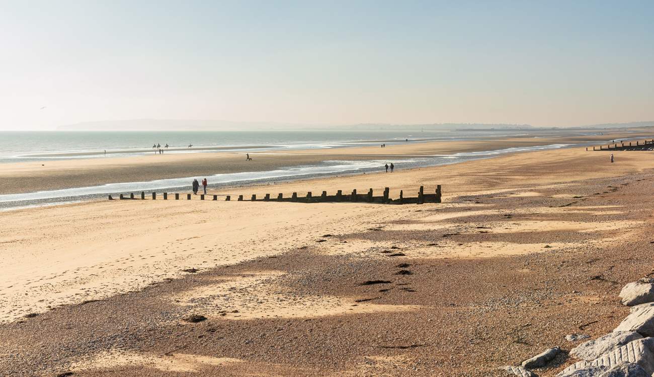 Pack a picnic, a bucket and spade and visit Camber Sands.