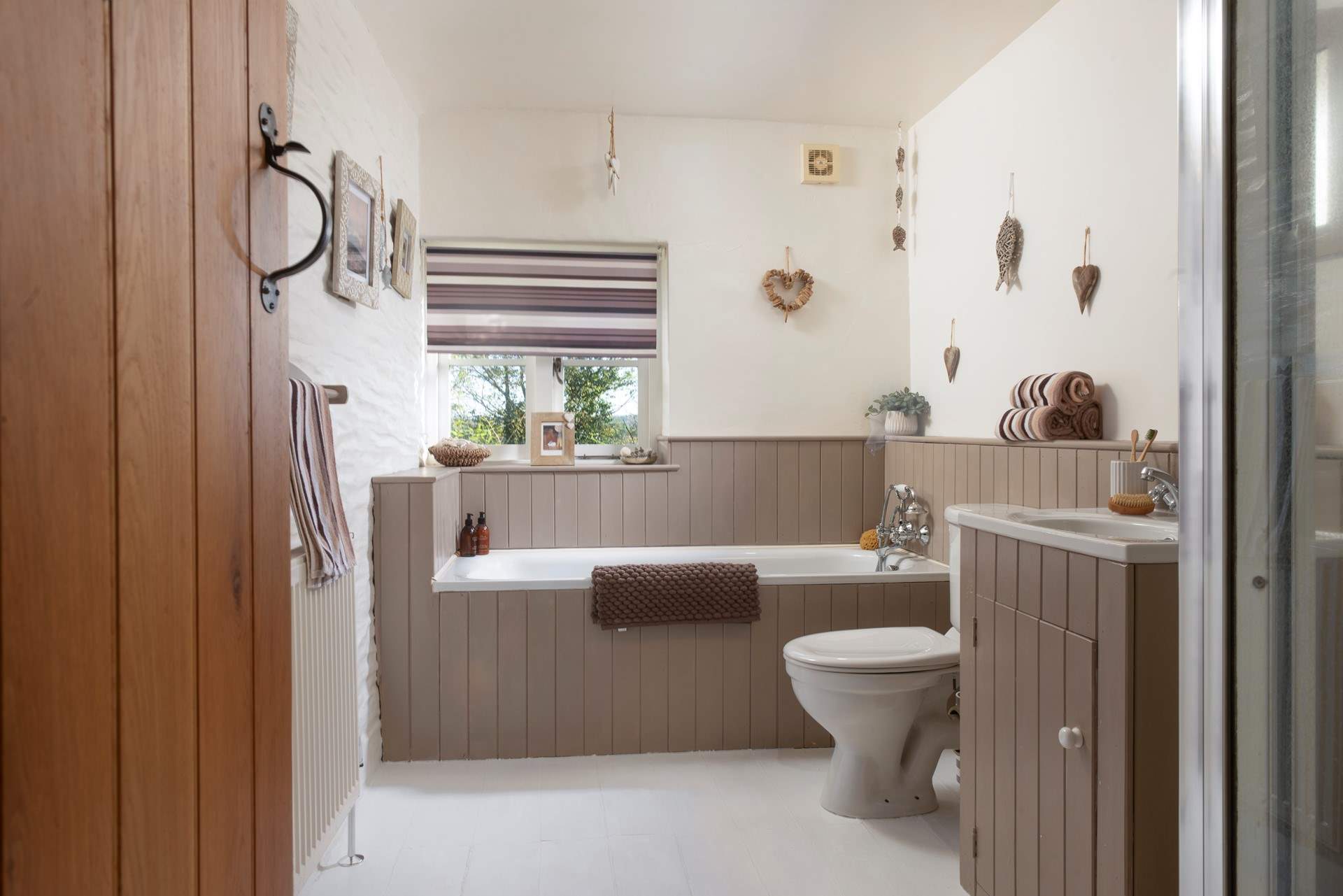 The family bathroom has a separate bath...