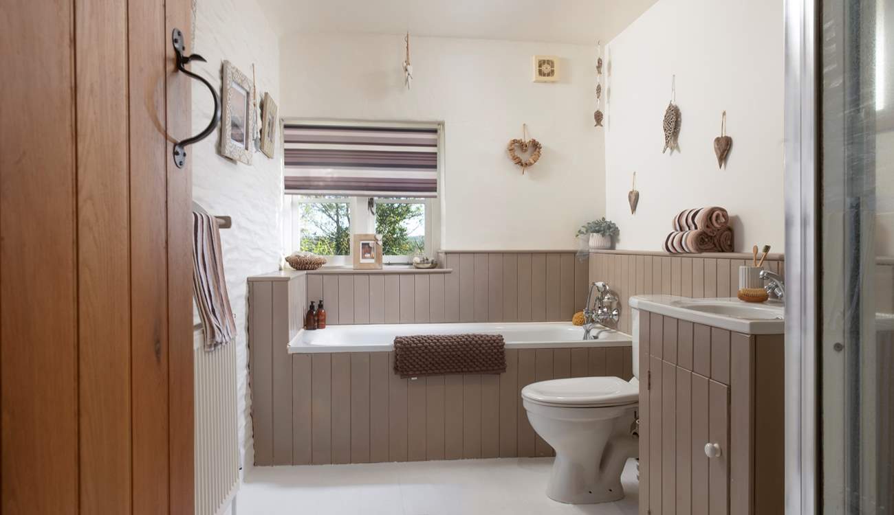 The family bathroom has a separate bath...