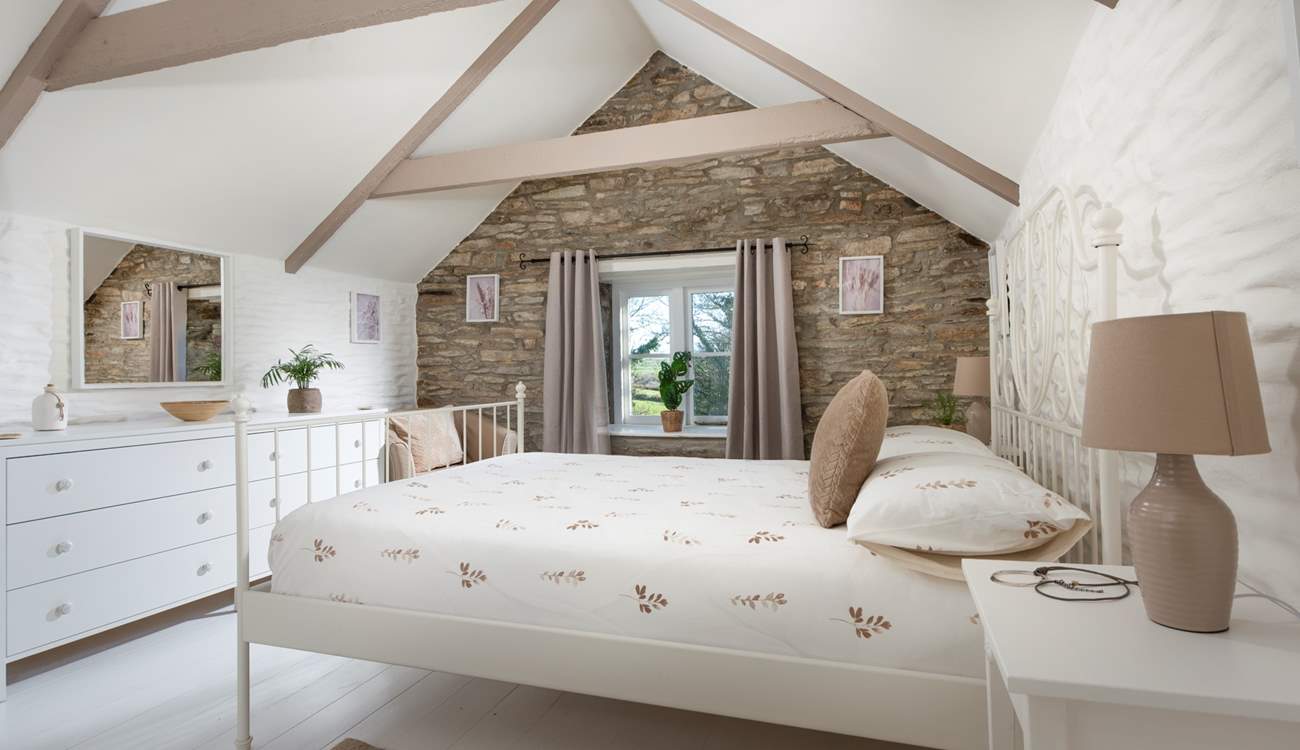 The delights continue in bedroom 3 with the exposed stone wall and vaulted ceiling adding to the overall charm and character.