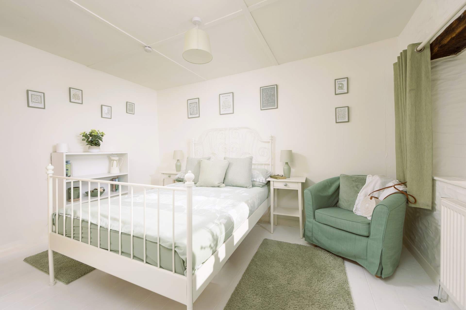 Soft shades of green make for a relaxing room.