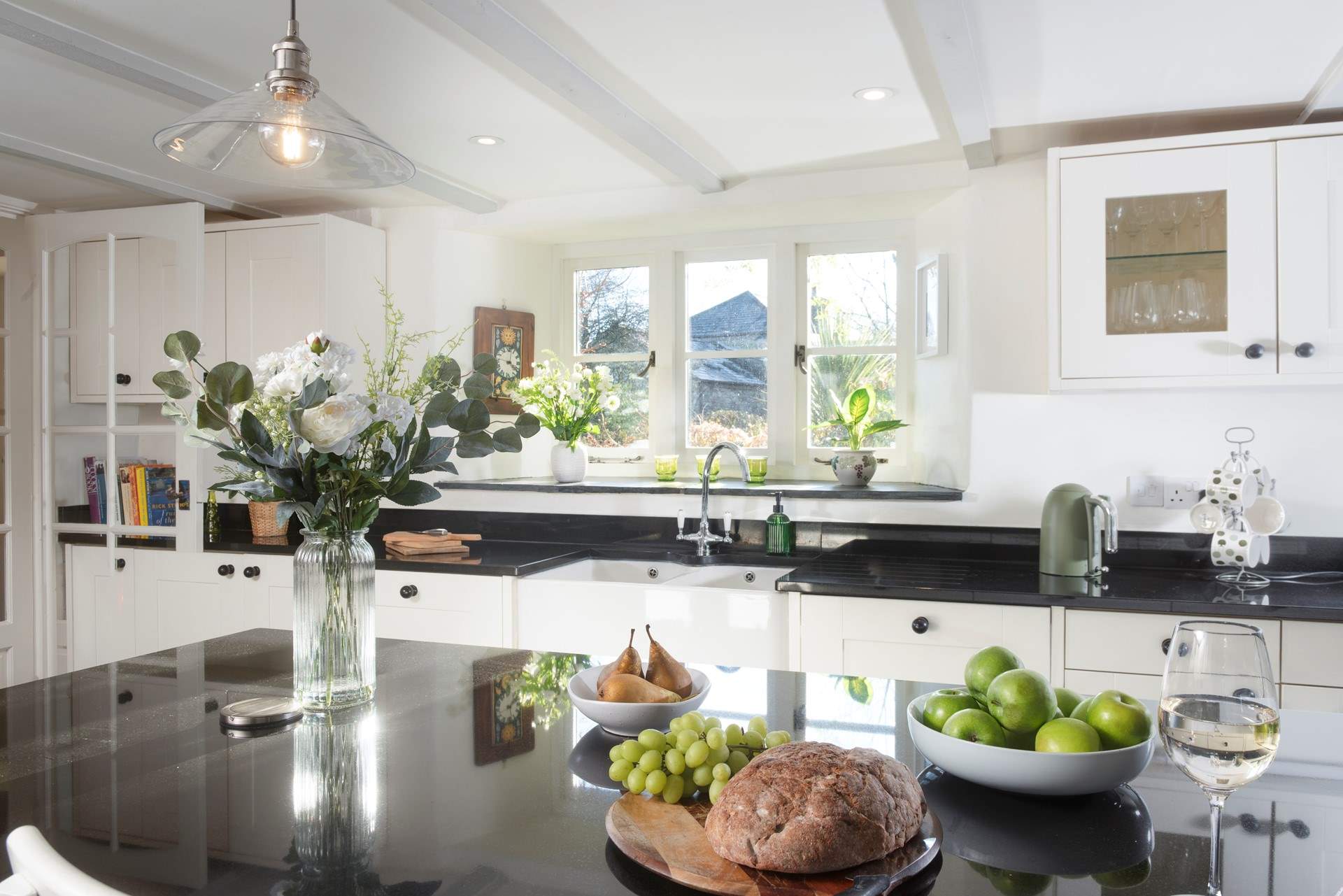 A beautifully appointed kitchen/dining space made for memorable meals and easy entertaining.