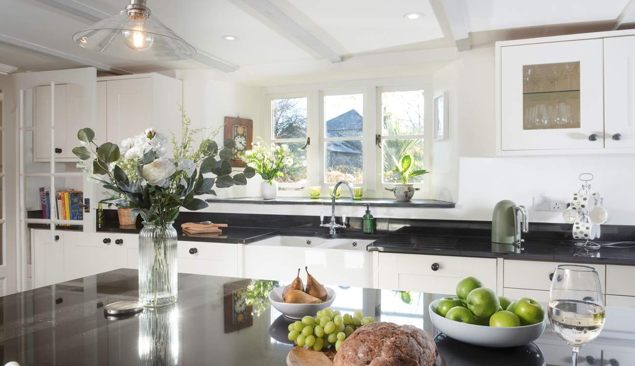 A beautifully appointed kitchen/dining space made for memorable meals and easy entertaining.