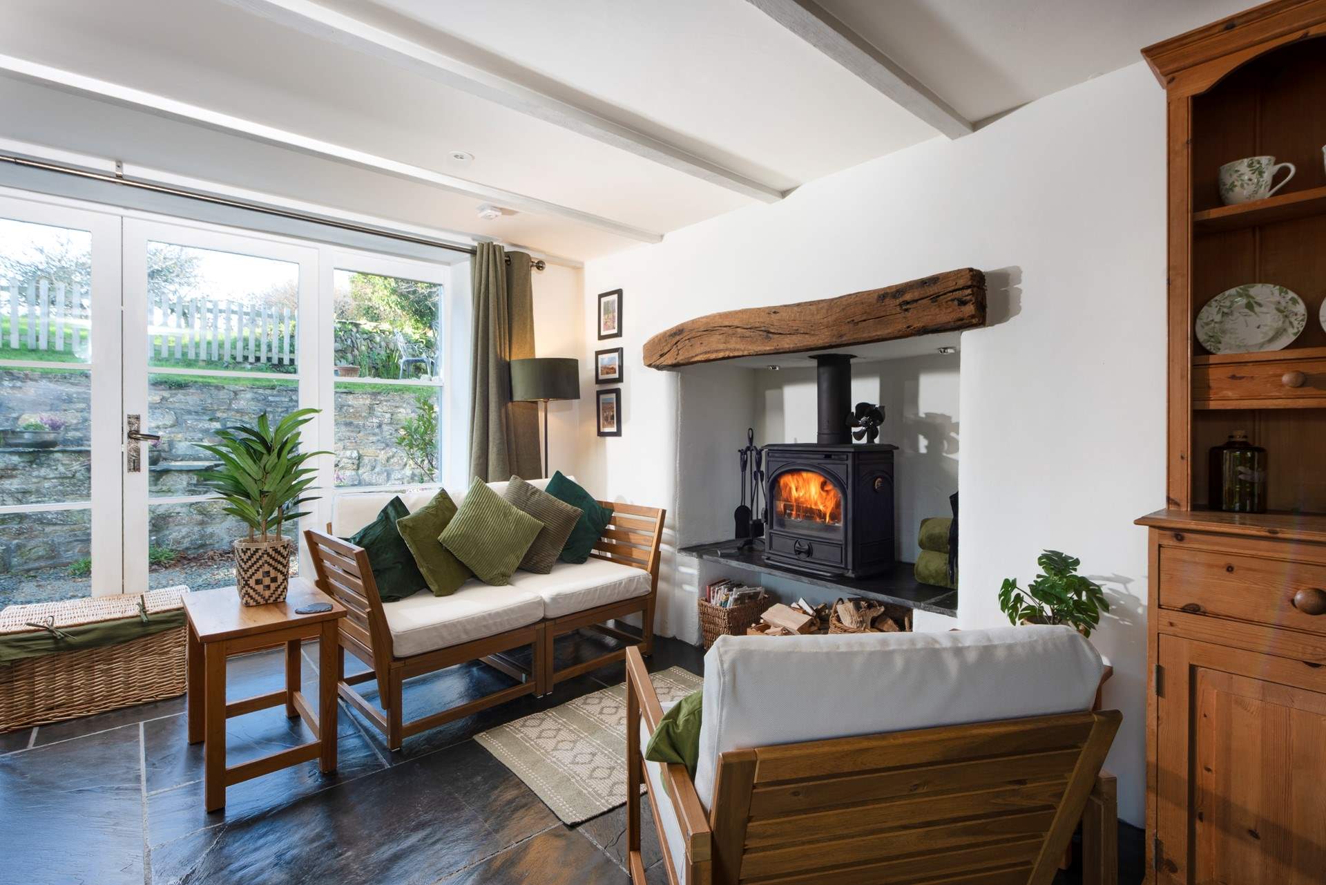 You can cosy up by the wood-burner on chillier days.