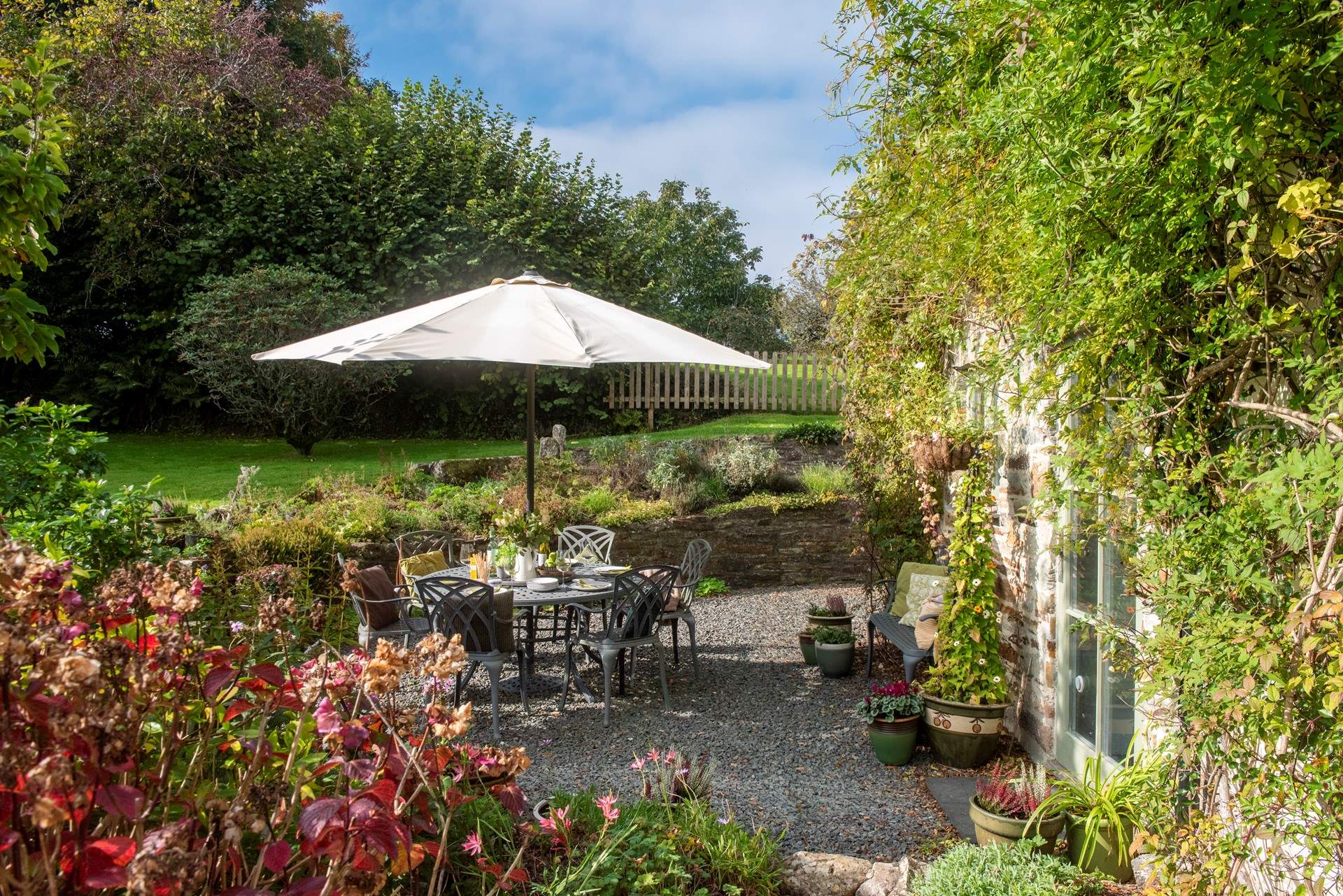 Dining al fresco is a must in the beautiful garden.