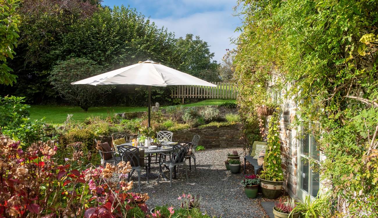 Dining al fresco is a must in the beautiful garden.