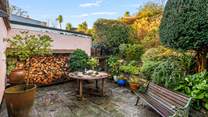 The ground floor patio area is a great space to enjoy a spot of dining al fresco.