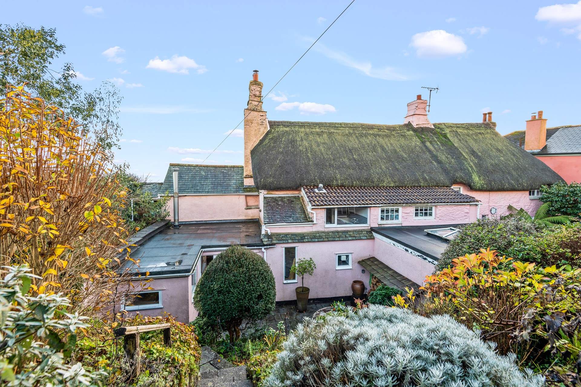 Looking down to the ground floor courtyard from the top garden. Please take care when venturing up and down the steps.