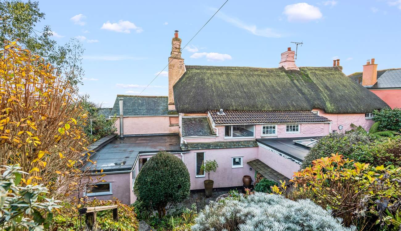 Looking down to the ground floor courtyard from the top garden. Please take care when venturing up and down the steps.