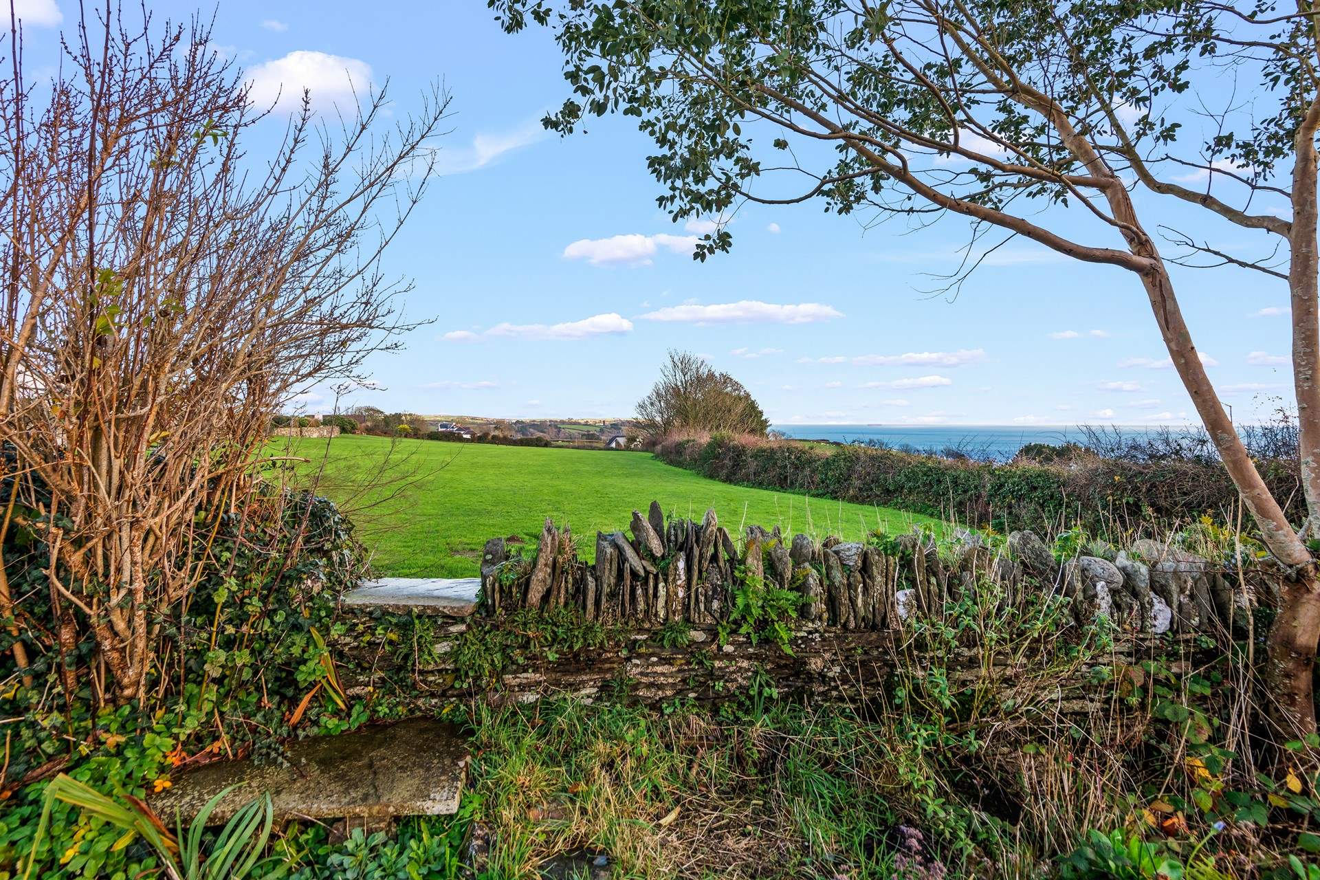 Country and coast in the same view is rather special. This view can be enjoyed all day long from the top garden area.