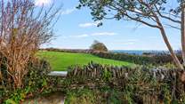 Country and coast in the same view is rather special. This view can be enjoyed all day long from the top garden area.