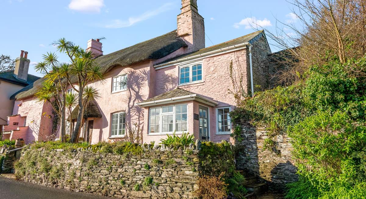 Welcome to Glen Cottage, a beautiful thatched cottage perched in the pretty village of Strete, looking out to sea.