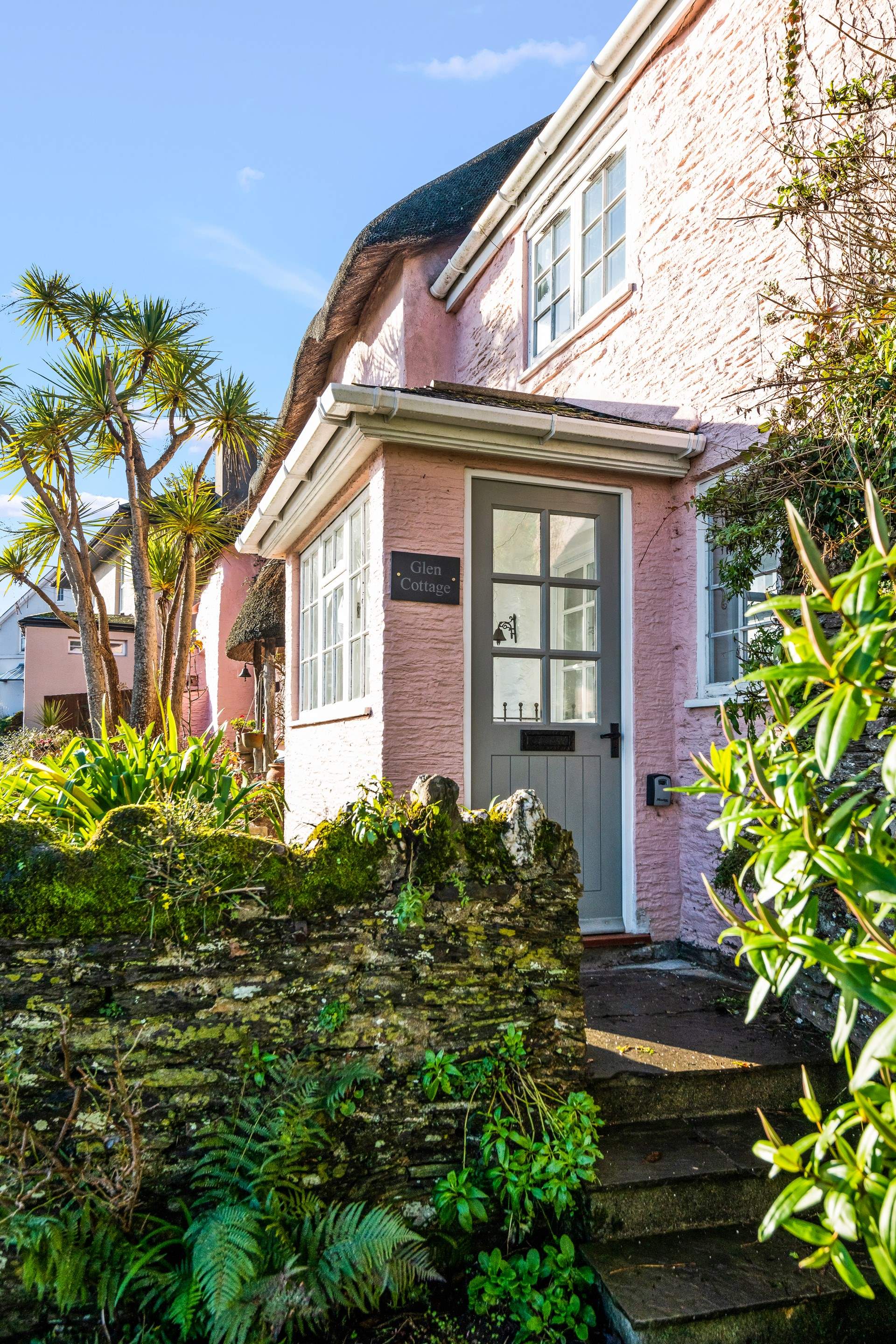 Glen Cottage is accessed up a small flight of steps.