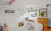 Bedroom 1 is bright and airy, with great views out to sea. - Thumbnail Image