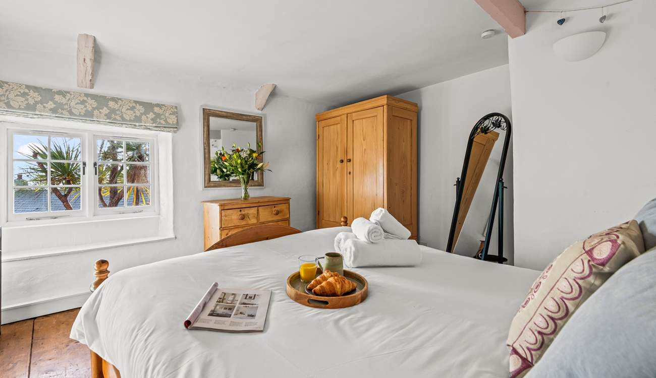 Bedroom 1 is home to this super inviting king-size bed.