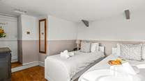 Bedroom 2 can be configured as a twin room or a king-size double.