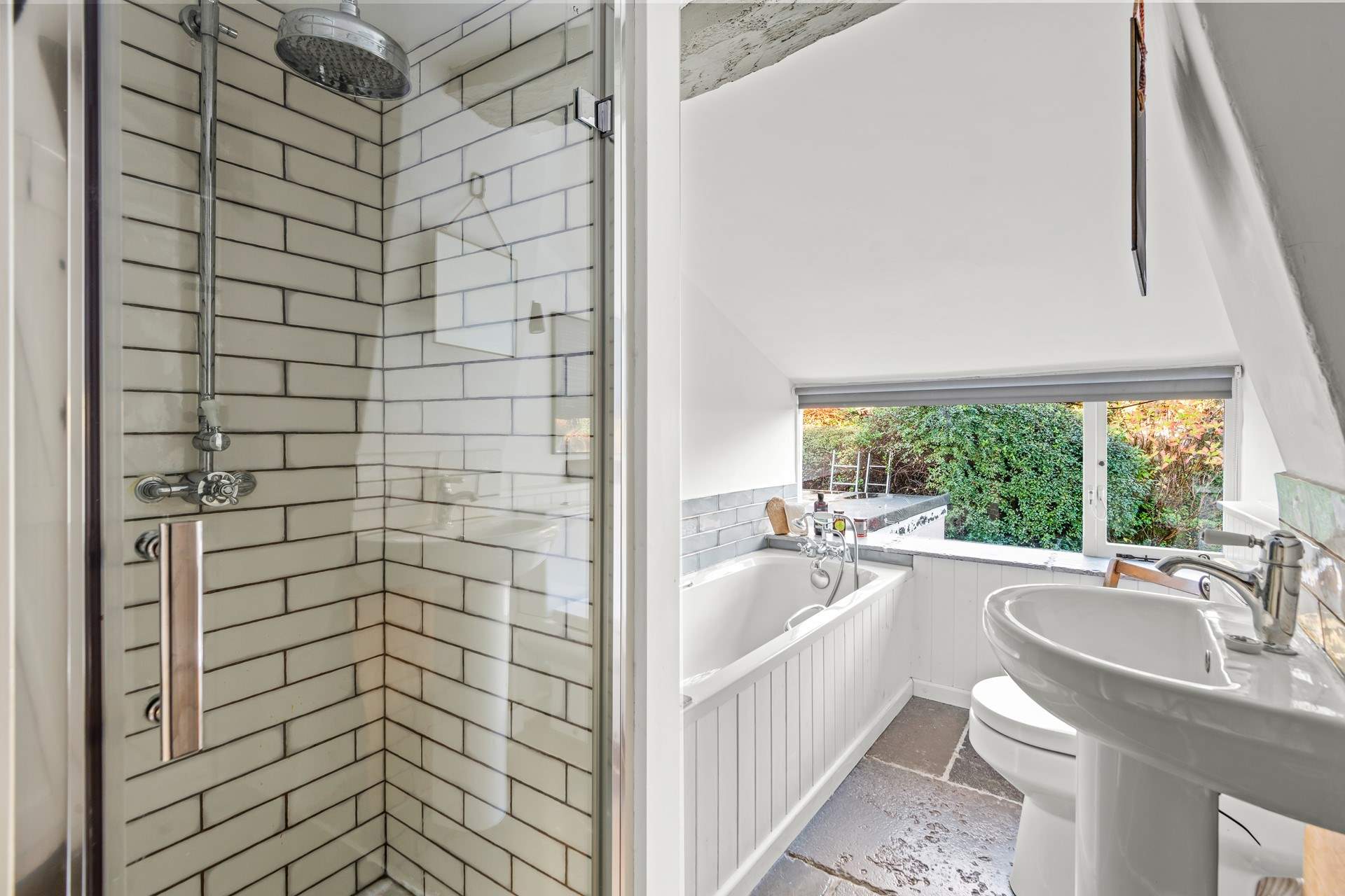 The family bathroom on the first floor, complete with shower cubicle.