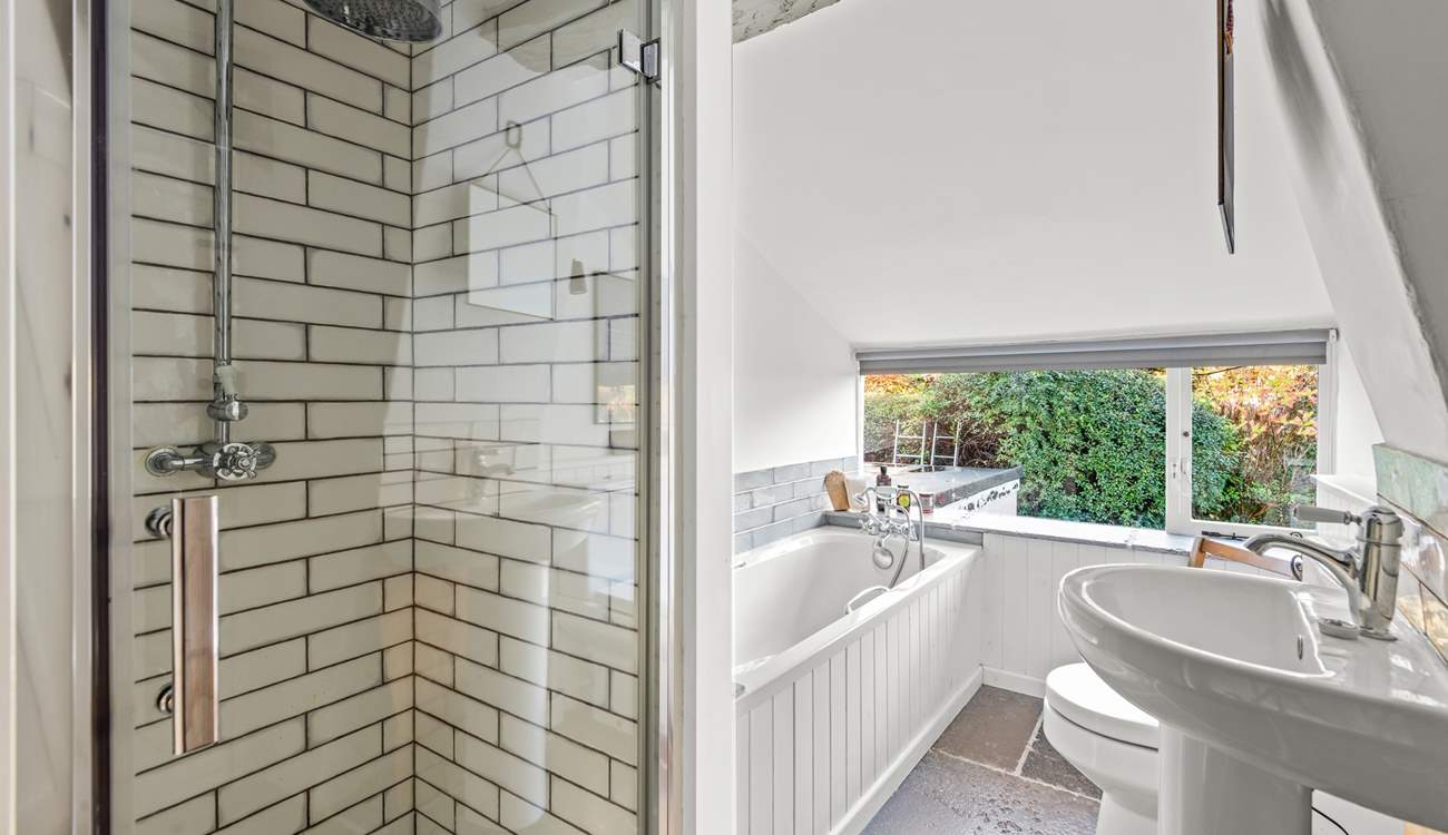 The family bathroom on the first floor, complete with shower cubicle.