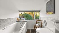 The family bathroom on the first floor. There is also a shower cubicle within this bathroom.