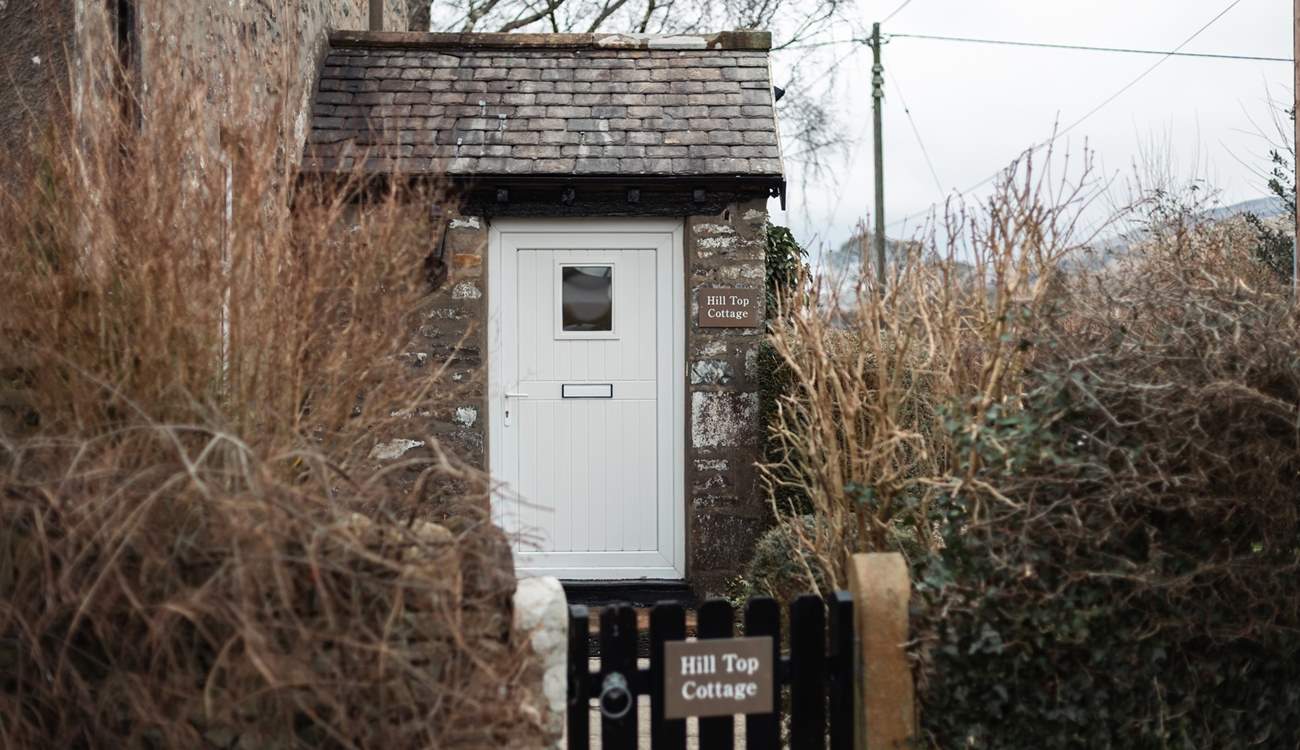 The front door to picturesque Hill Top Cottage. 