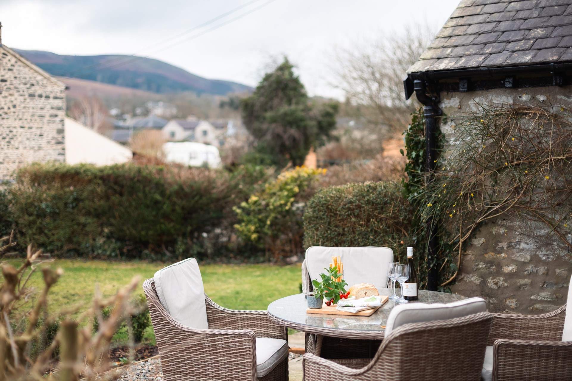 Dine in the garden with a stunning backdrop.