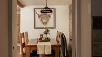 The curious cow is a perfect dining companion. 