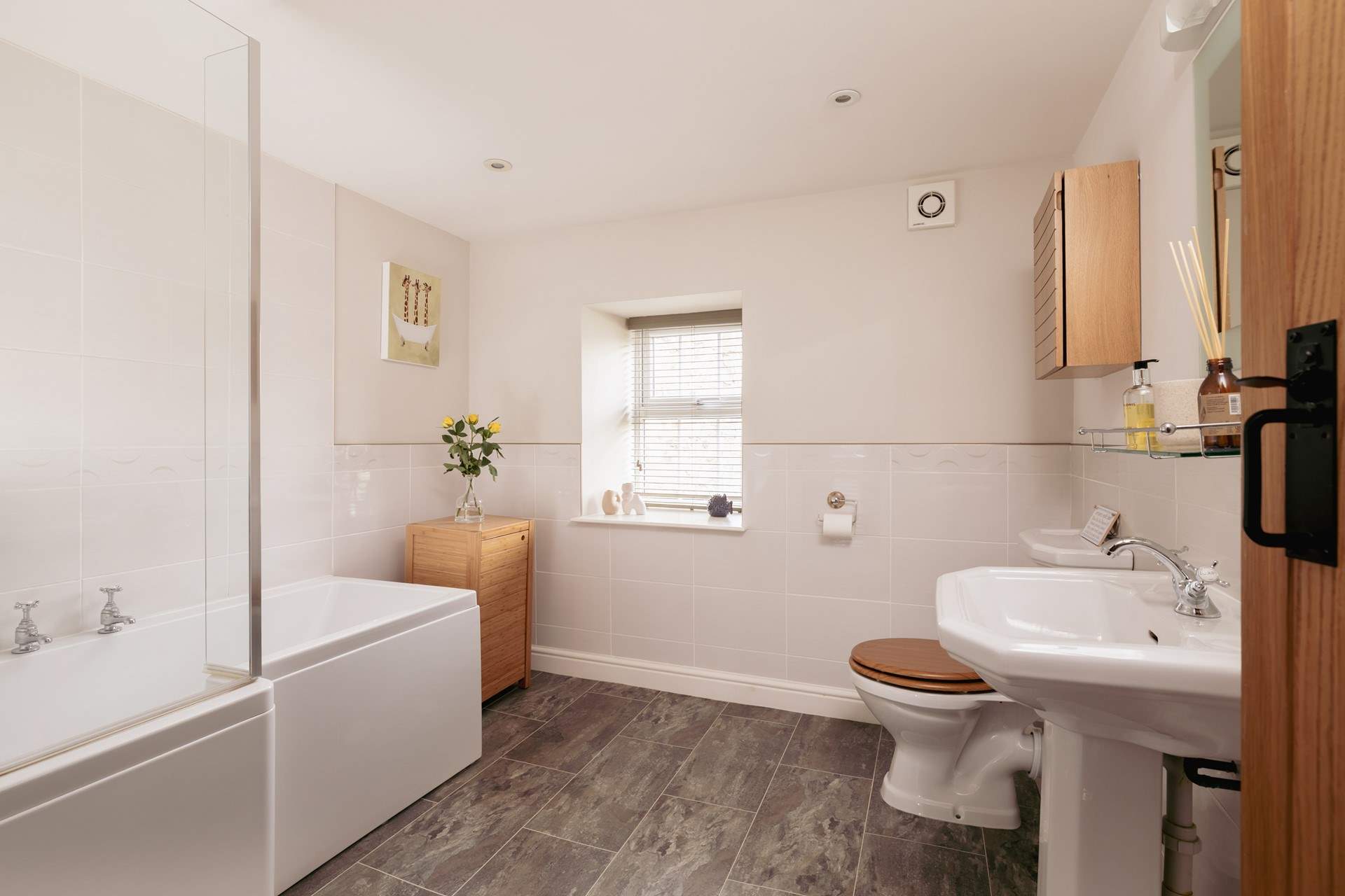 Bedroom 1 has it's own large bathroom, there is a shower over the bath for your comfort.